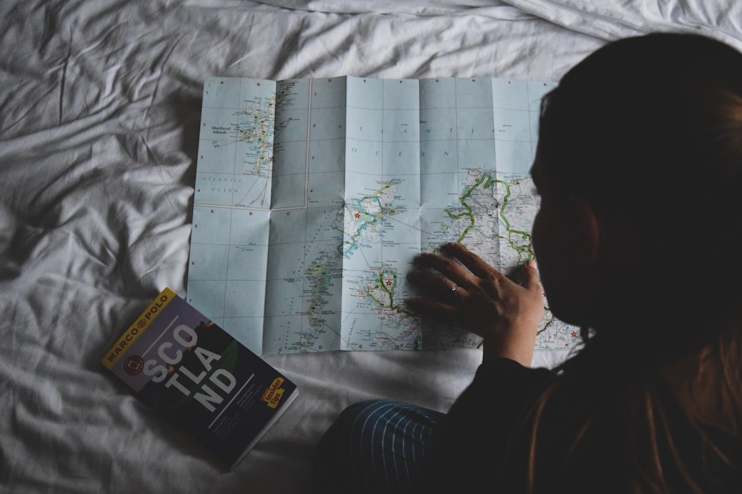 researcher studying old maps